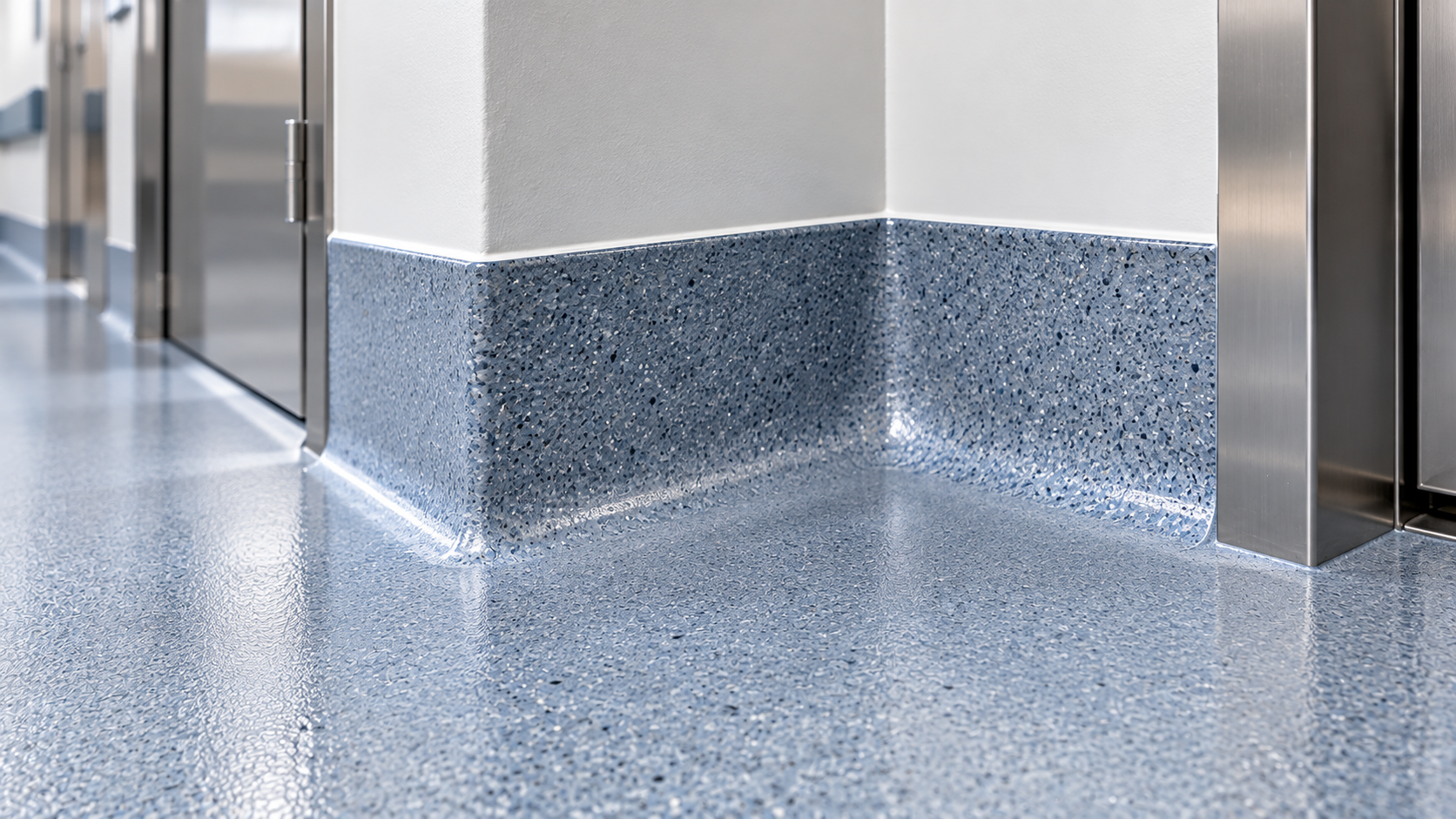 Illustration of seamless healthcare epoxy flooring with integral cove base at wall transition